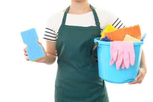Technician preparing safe oven cleaning equipment before work