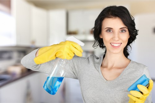 Technician working safely around a kitchen appliance