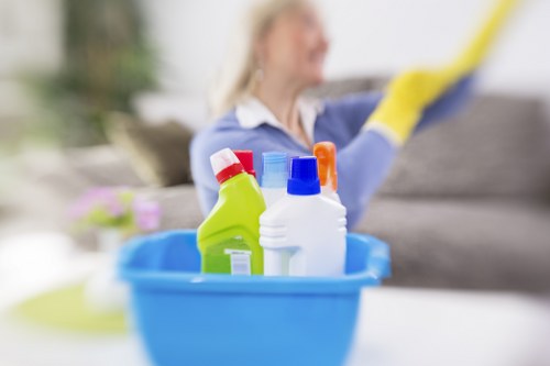 Local oven cleaner working in a Highbury apartment kitchen