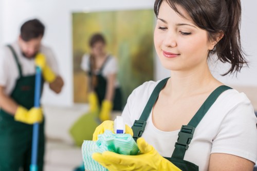 Local cleaner tidying a kitchen in Highbury