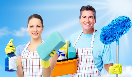 Technician wearing PPE during an oven cleaning service
